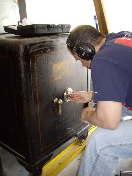 Anthony opening a safe