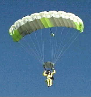 Anthony Martin glides to safety with his parachute
